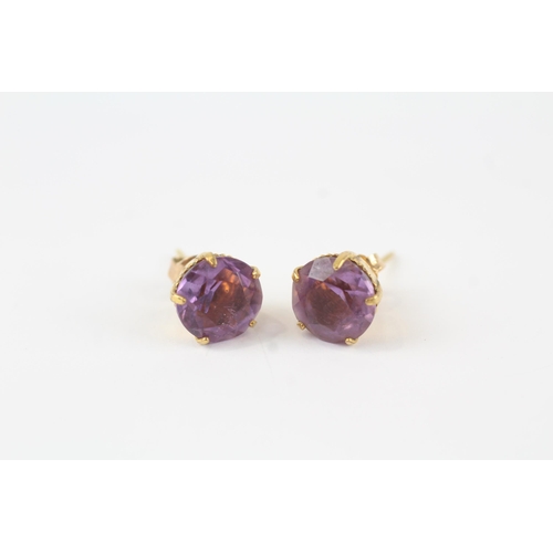 93 - 9ct gold vintage amethyst paired stud earrings (2.9g)