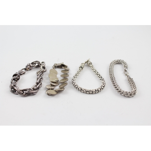 201 - Four silver bracelets including popcorn link (81g)