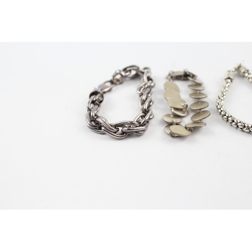 201 - Four silver bracelets including popcorn link (81g)