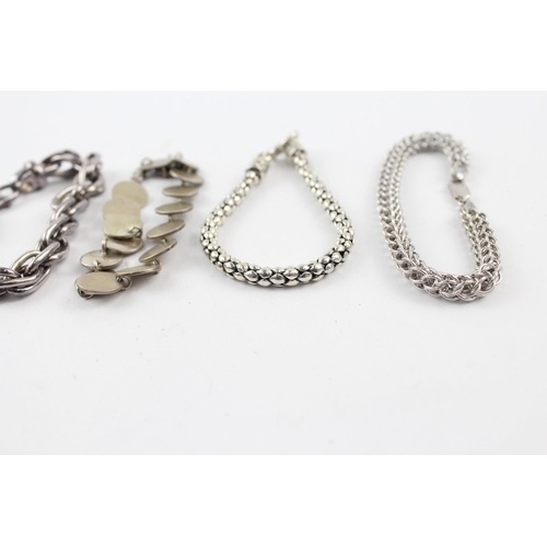 201 - Four silver bracelets including popcorn link (81g)