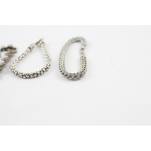 201 - Four silver bracelets including popcorn link (81g)