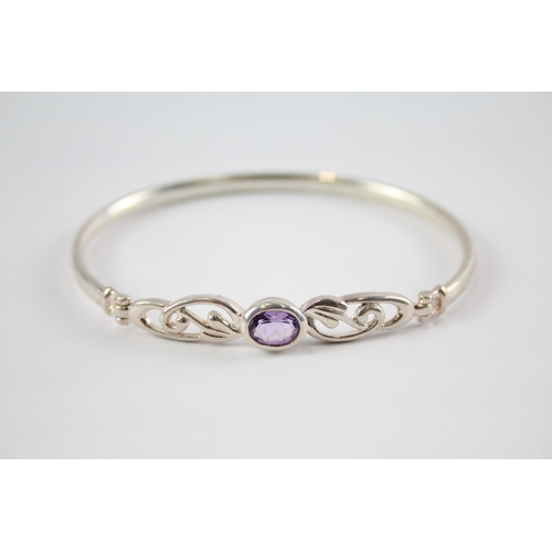 203 - Four silver CZ bangles including Celtic (41g)