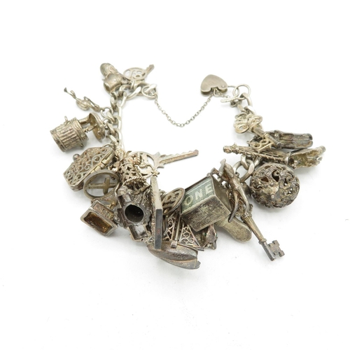 206 - Silver charm bracelet including emergency money charm (95g)