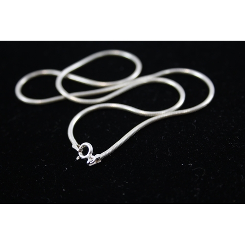 208 - A collection of silver chain necklaces including curb link (87g)