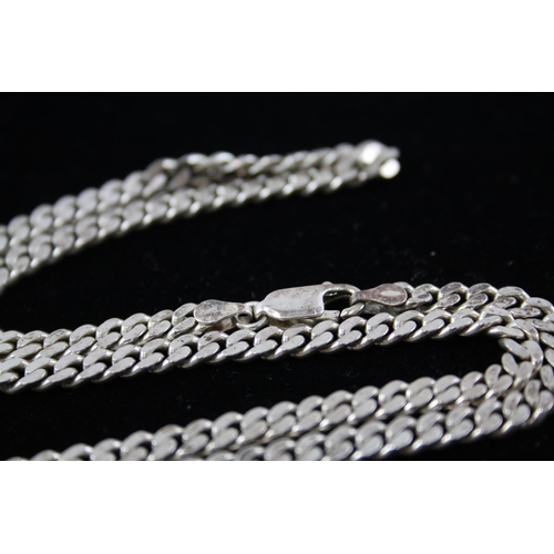 208 - A collection of silver chain necklaces including curb link (87g)