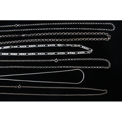 210 - A collection of silver chain necklaces including figaro link (98g)