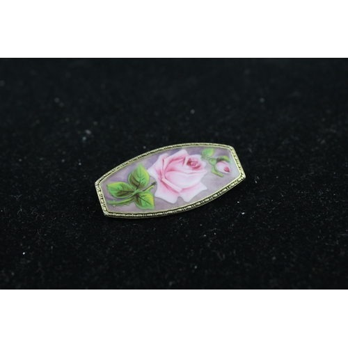 221 - Silver enamel rose design brooch (14g)