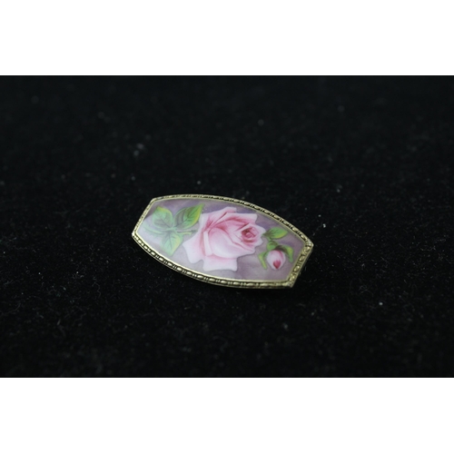 221 - Silver enamel rose design brooch (14g)