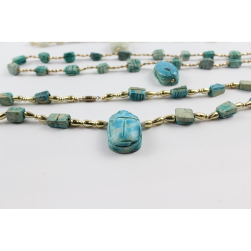 237 - Three Egyptian carved necklaces (223g)