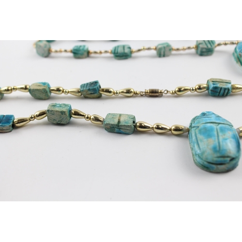 237 - Three Egyptian carved necklaces (223g)