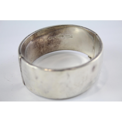 239 - Two silver antique bangles including gold detailing (114g)