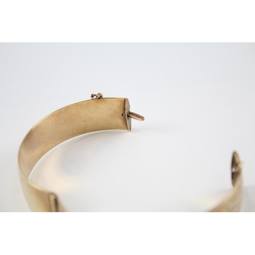 240 - 9ct rolled gold bangle with etched design (41g)