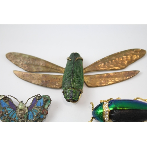 244 - Three antique bug brooches as seen (30g)