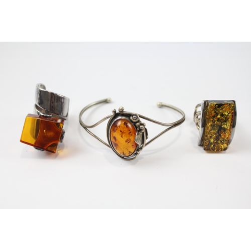 261 - A collection of silver Amber jewellery including modernist (49g)