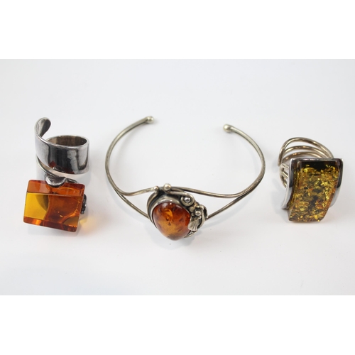 261 - A collection of silver Amber jewellery including modernist (49g)