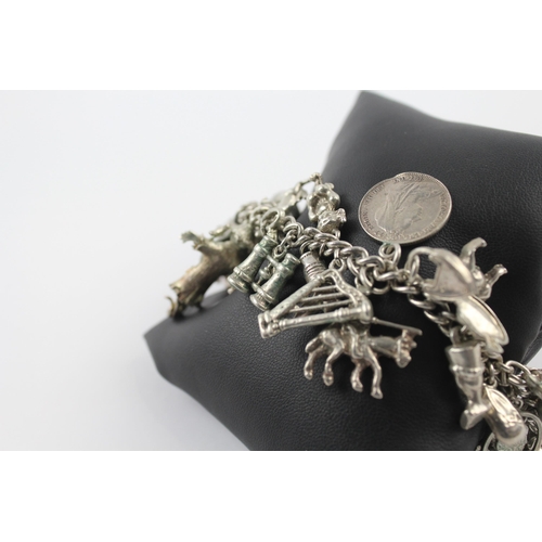 287 - Silver charm bracelet including animal charms (121g)