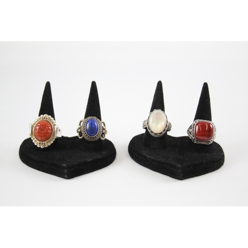 289 - Four silver gemstone rings including Suarti (47g)