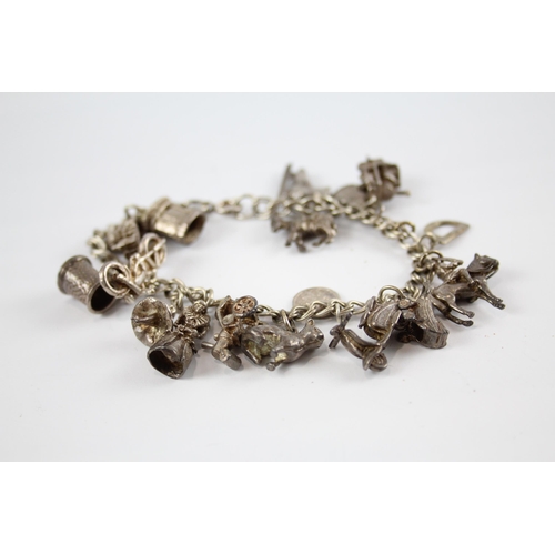 296 - Two silver charm bracelets including animal charms (87g)