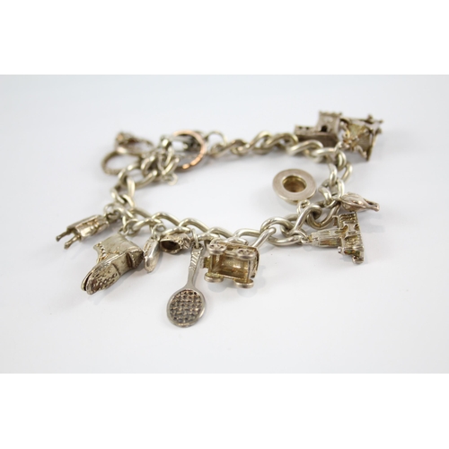 296 - Two silver charm bracelets including animal charms (87g)