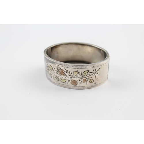 299 - Silver antique Victorian bangle with gold accents (28g)