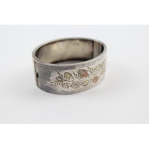 299 - Silver antique Victorian bangle with gold accents (28g)