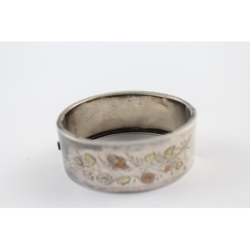 299 - Silver antique Victorian bangle with gold accents (28g)