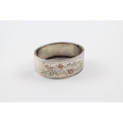 299 - Silver antique Victorian bangle with gold accents (28g)