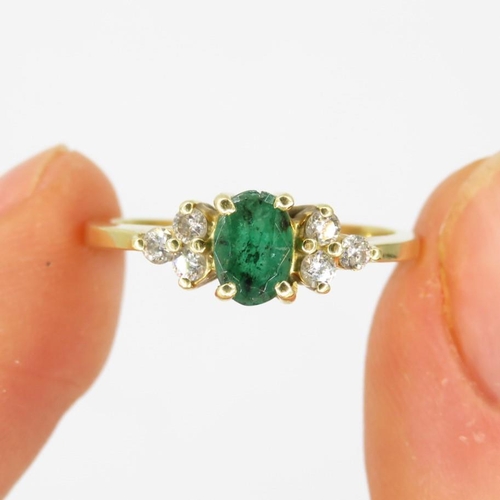 149 - 18ct gold emerald & diamond dress ring (2.4g) Size  K