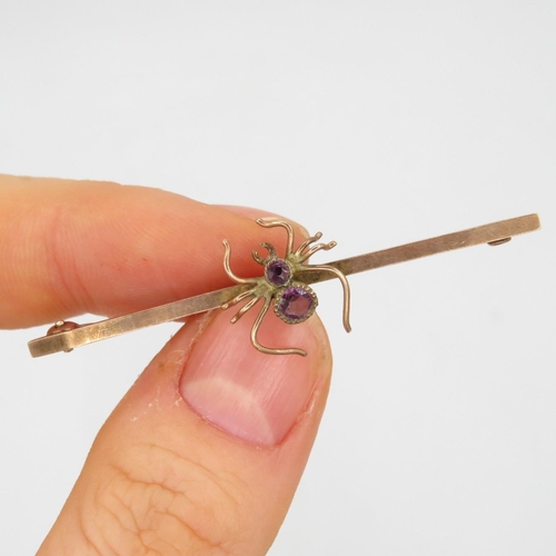 63 - 9ct gold antique amethyst spider bar brooch (1.5g)