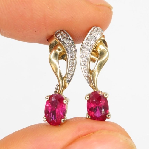 84 - 9ct gold vintage synthetic ruby & diamond paired drop earrings (2g)