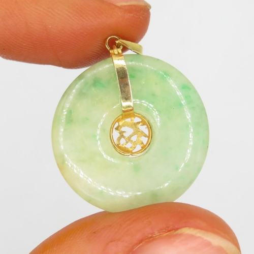 167 - 18ct gold jade pendant (3.5g)