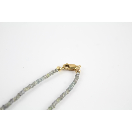 101 - 9ct gold clasp green sapphire single strand necklace (8.4g)