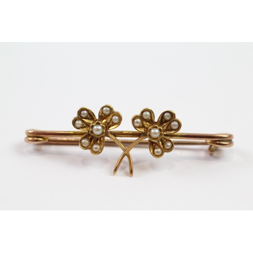 116 - 9ct gold antique seed pearl double shamrock bar brooch with 15ct gold front (2.8g)