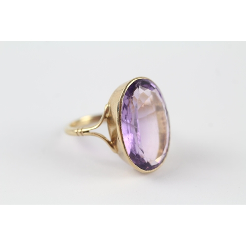 124 - 9ct gold amethyst single stone cocktail ring (6.6g) Size  Q