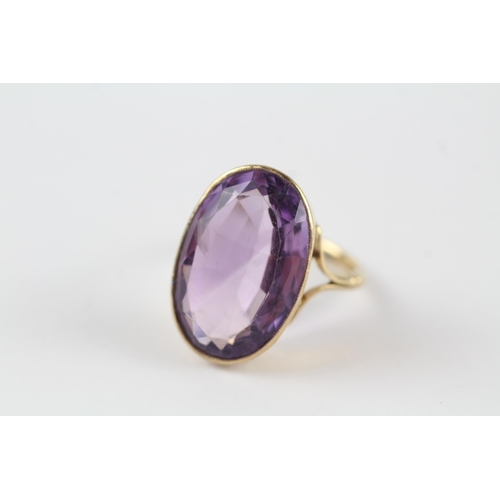 124 - 9ct gold amethyst single stone cocktail ring (6.6g) Size  Q