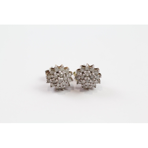 129 - 9ct gold diamond cluster stud earrings (1.4g)