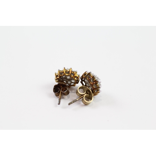 129 - 9ct gold diamond cluster stud earrings (1.4g)