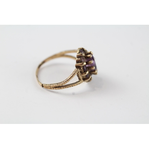 131 - 9ct gold amethyst vintage cluster ring (2g).  Ring has been cut off Size  M