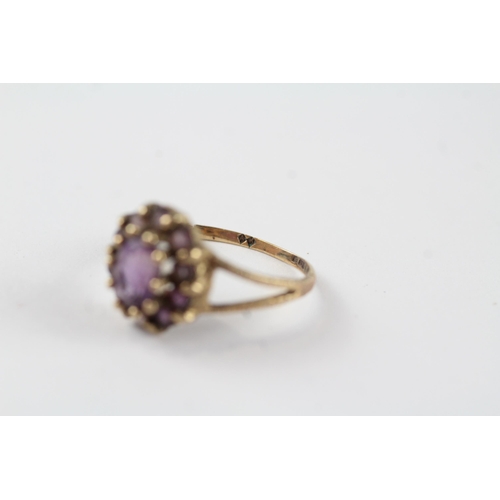 131 - 9ct gold amethyst vintage cluster ring (2g).  Ring has been cut off Size  M