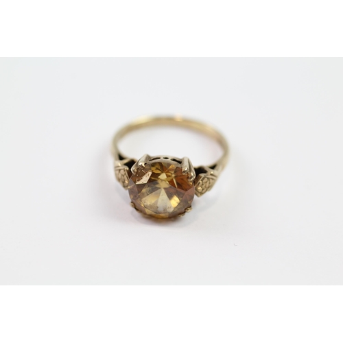 135 - 9ct gold 1960's yellow zircon dress ring (2.9g) Size  J