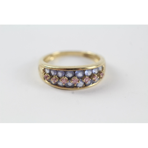 139 - 9ct gold tanzanite & pink sapphire half eternity ring (3g) Size  R