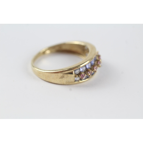 139 - 9ct gold tanzanite & pink sapphire half eternity ring (3g) Size  R