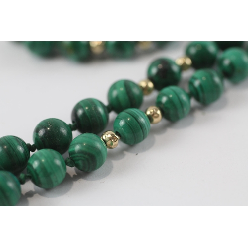 141 - 14ct gold Malachite bead necklace (66.8g)