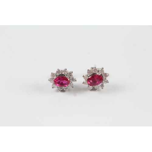 148 - 9ct white gold synthetic ruby & clear gemstone cluster stud earrings (2.7g)