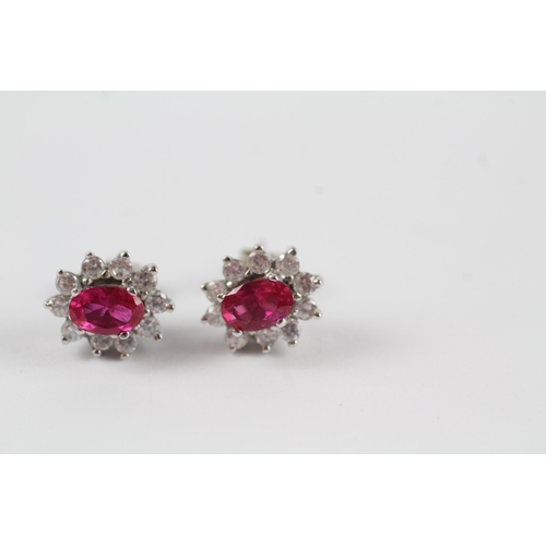 148 - 9ct white gold synthetic ruby & clear gemstone cluster stud earrings (2.7g)