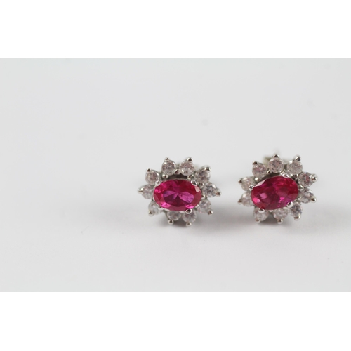 148 - 9ct white gold synthetic ruby & clear gemstone cluster stud earrings (2.7g)