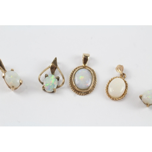 159 - 5 x 9ct gold white opal pendants (2.8g)