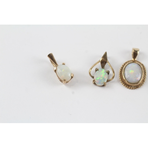 159 - 5 x 9ct gold white opal pendants (2.8g)