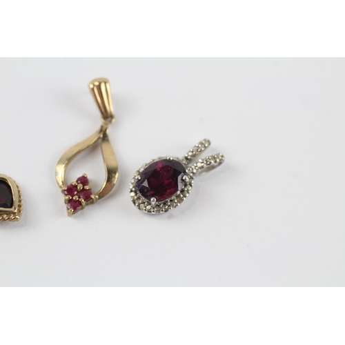 160 - 4 x 9ct gold gemstone pendants inc. diamond, garnet & ruby (3.6g)