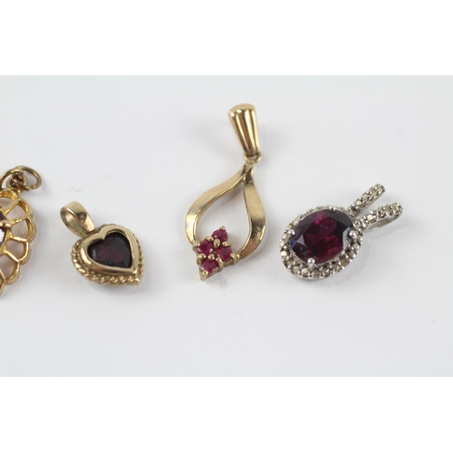 160 - 4 x 9ct gold gemstone pendants inc. diamond, garnet & ruby (3.6g)